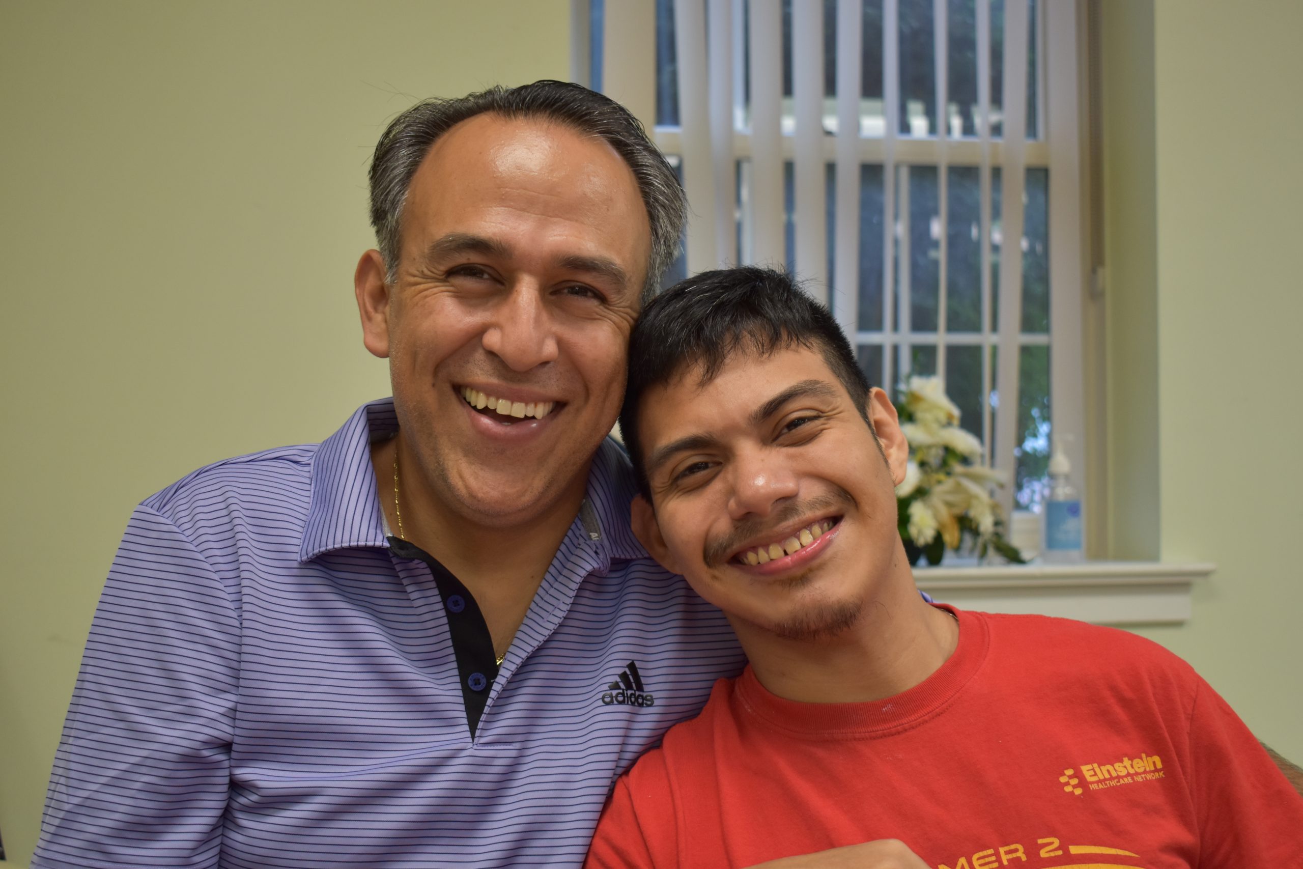 An advocate and his partner smile because they have a special relationship