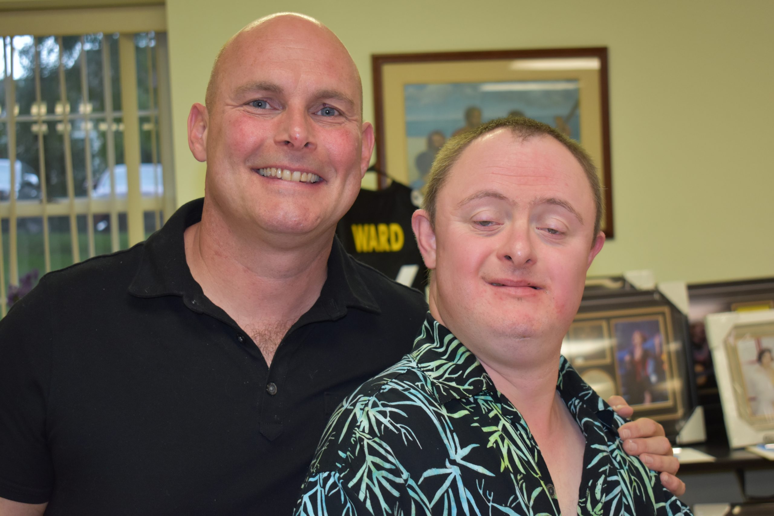 An advocate and his partner smile because they have a special relationship