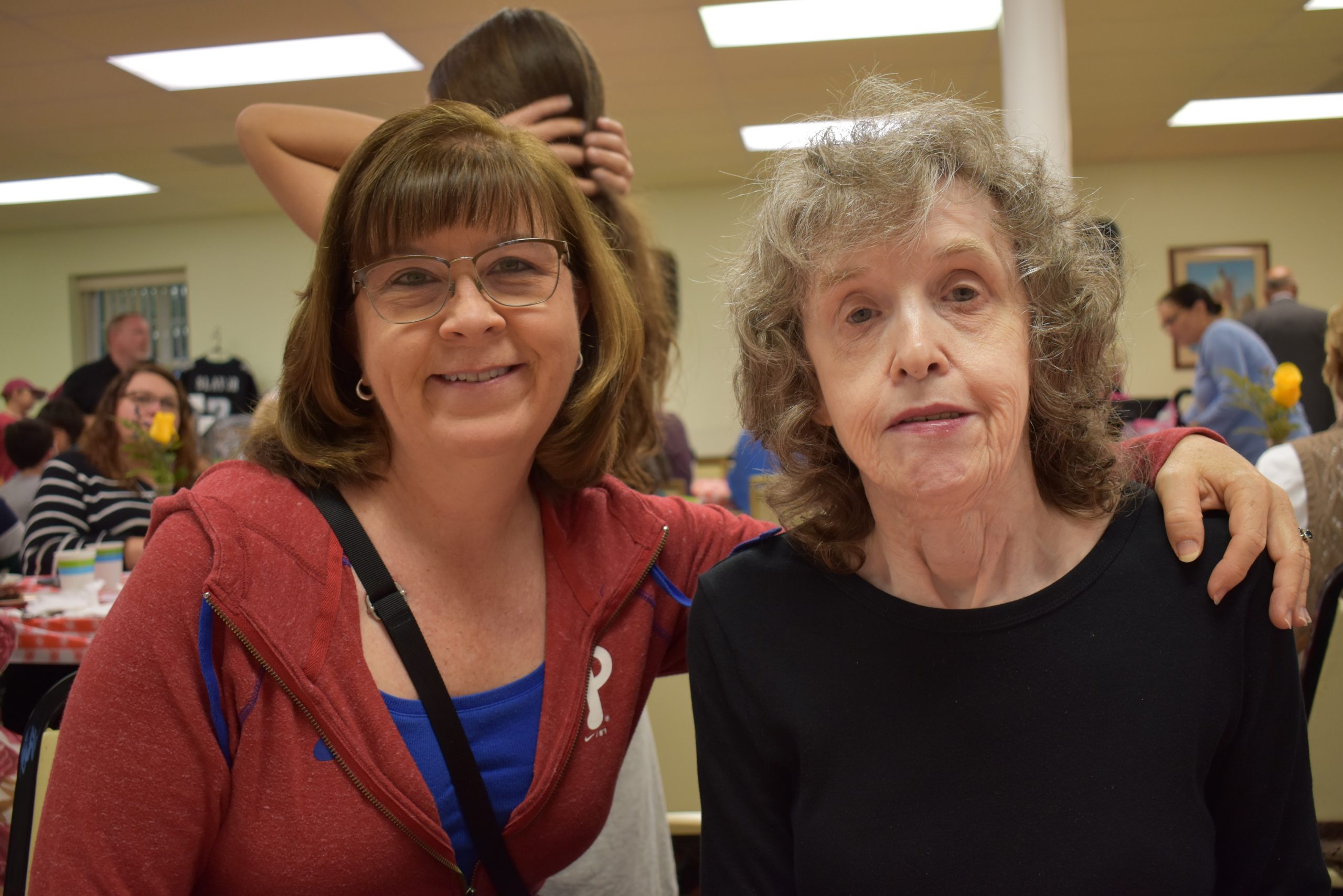 An advocate and her partner smile because they have a special relationship