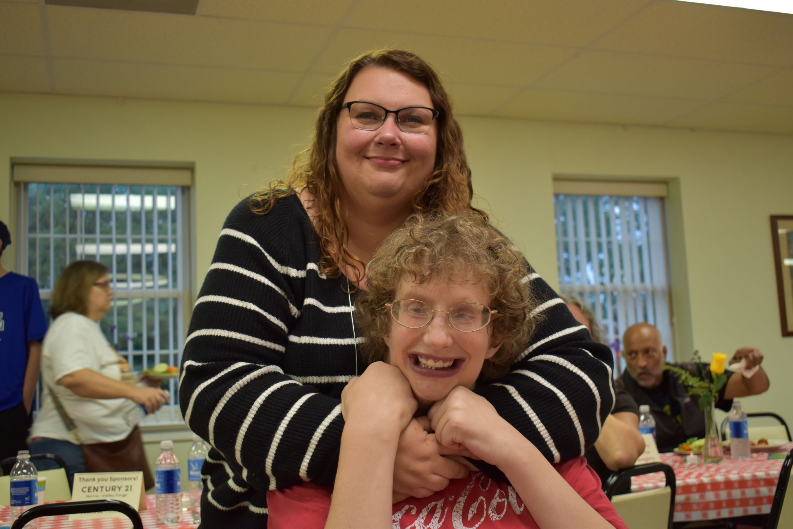 An advocate and her partner smile because they have a special relationship