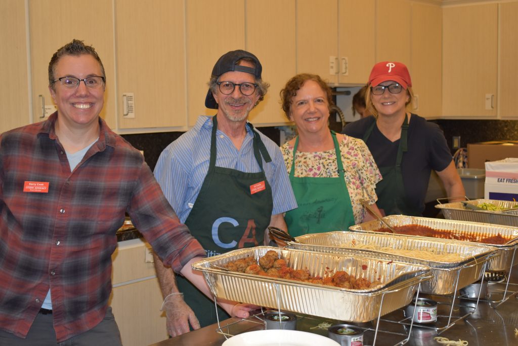 A group of volunteers working in the kitchen at our annual Spaghetti Dinner